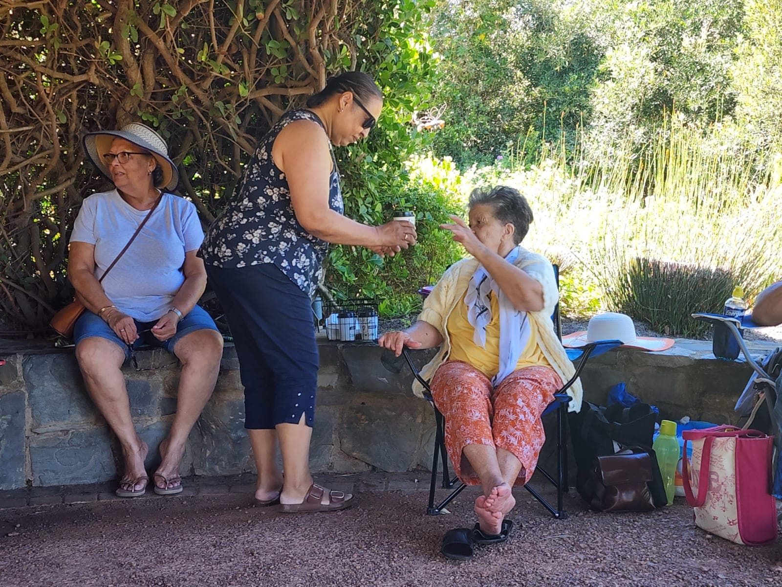 Seniors smiling at a decorated table